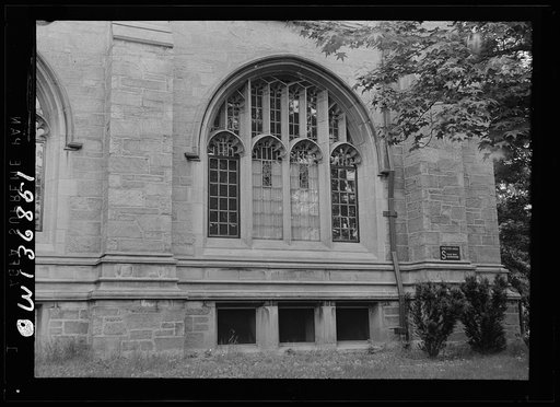 Washington, D. C. Air raid shelter area sign on the chapel of a seminary at the Catholic University