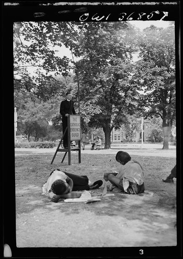 Washington, D. C. A speaker for the Catholic Evidence Guild speaking in Logan Circle on a hot Sunday afternoon