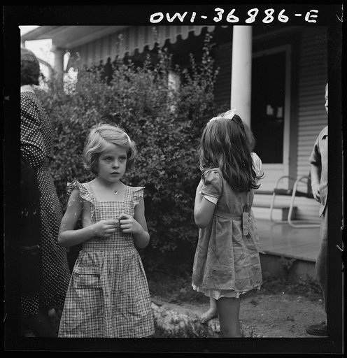 Children watching a Greyhound bus that broke down in a small town in Pennsylvania on the way to Pittsburgh from Washington, D.C.