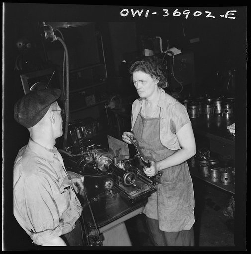 Pittsburgh, Pennsylvania. One of the women employees in the machine shop of the Greyhound garage working on a cylinder grinding machine