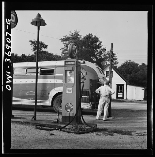 A Greyhound bus that has been stopped at a filling station to get water between Washington, D.C. and Pittsburgh, Pennsylvania
