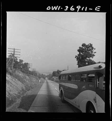A Greyhound bus going from Washington, D.C. to Pittsburgh, Pennsylvania on a highway in Pennsylvania