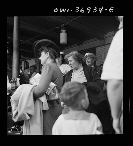 Untitled photo, possibly related to: Pittsburgh, Pennsylvania. Passengers waiting for a bus at the Greyhound bus terminal