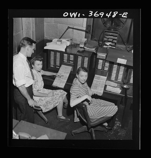 Pittsburgh, Pennsylvania. Part of the office staff with the card system which lists parts in the Greyhound garage