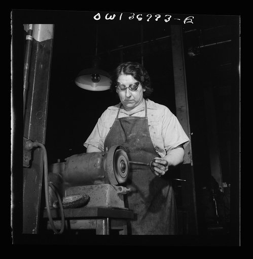 Pittsburgh, Pennsylvania. Woman employee of the mechanic shop in the Greyhound garage