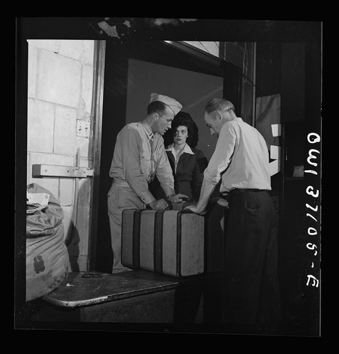 Pittsburgh, Pennsylvania. Passengers checking their bags at the Greyhound bus terminal