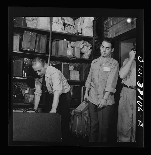 Pittsburgh, Pennsylvania. Baggage clerks at the Greyhound bus terminal