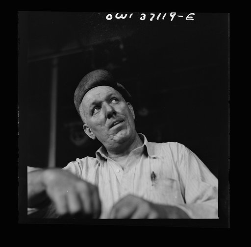 Pittsburgh, Pennsylvania. A mechanic in the machine shop at the Greyhound garage