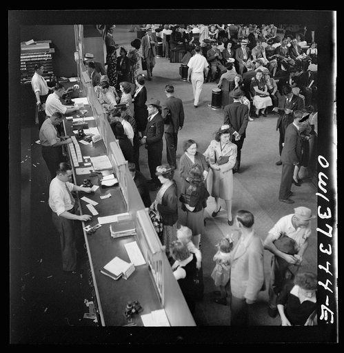 Untitled photo, possibly related to: Pittsburgh, Pennsylvania. People buying tickets at the Greyhound bus terminal