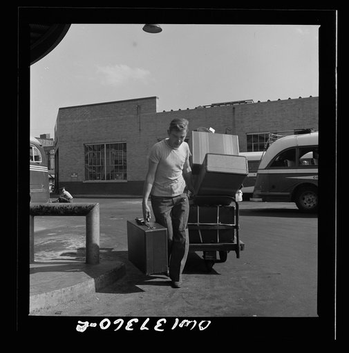Columbus, Ohio. Bringing baggage from a bus