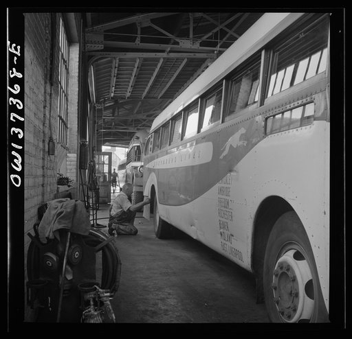 Untitled photo, possibly related to: Columbus, Ohio. Working on a bus in the Greyhound garage