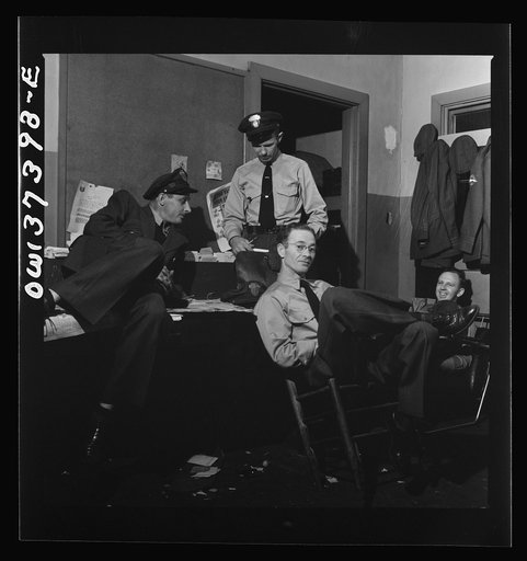 Untitled photo, possibly related to: Columbus, Ohio. Greyhound bus drivers resting in the drivers' room