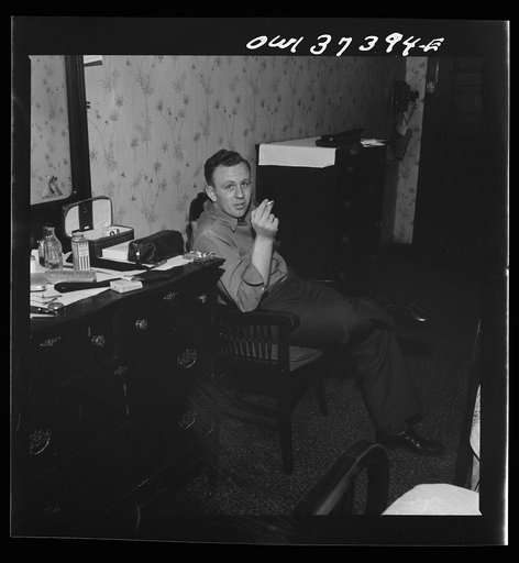 Untitled photo, possibly related to: Pittsburgh, Pennsylvania. Hotel room where Clem Carson, a Greyhound driver, lives and which he shares with another bus driver. They each pay six dollars a week