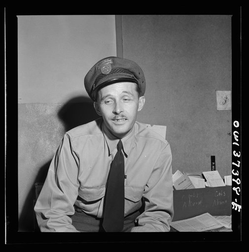 Untitled photo, possibly related to: Columbus, Ohio. Greyhound bus drivers waiting for their runs in the drivers' room
