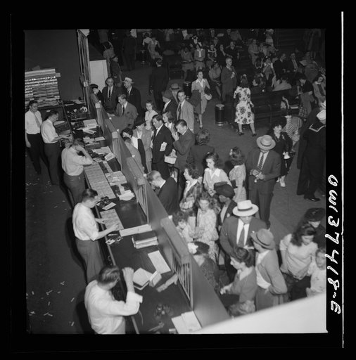 Untitled photo, possibly related to: Pittsburgh, Pennsylvania. A crowd buying tickets at the Greyhound bus terminal