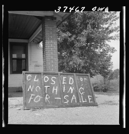 A sign in front of a former gas station on the road between Columbus and Cincinnati, Ohio