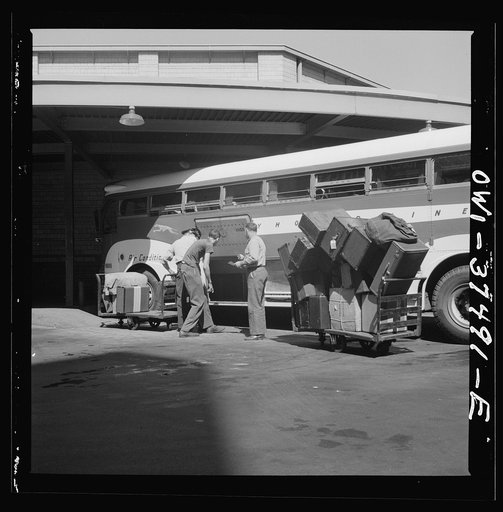 Cincinnati, Ohio. Loading baggage on to a Greyhound bus