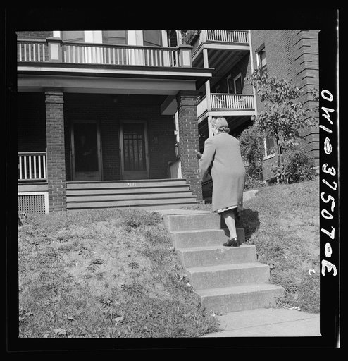 Cincinnati, Ohio. Mrs. Bernard Cochran, wife of a Greyhound bus driver, making a bond-selling call