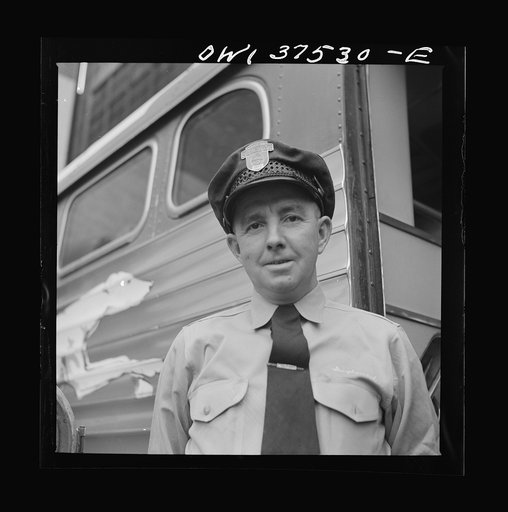 Untitled photo, possbly related to: Bernard Cochran, Greyhound bus driver. He has a perfect record of fourteen years, never having had an accident while driving a bus