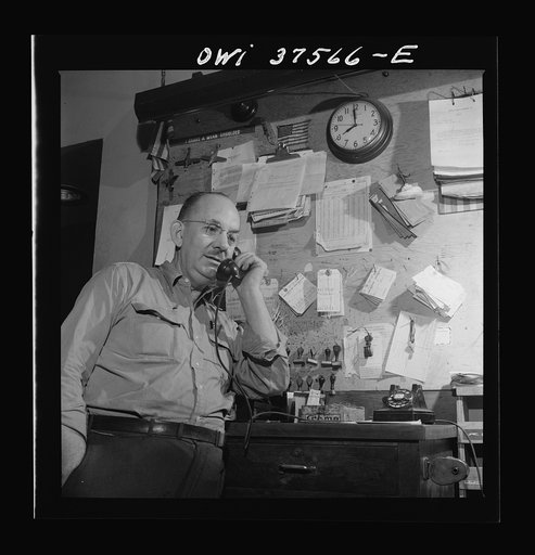 Cincinnati, Ohio. A baggage clerk in the Greyhound bus terminal