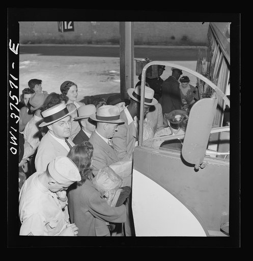 Cincinnati, Ohio. Passengers boarding a Greyhound bus at the bus terminal