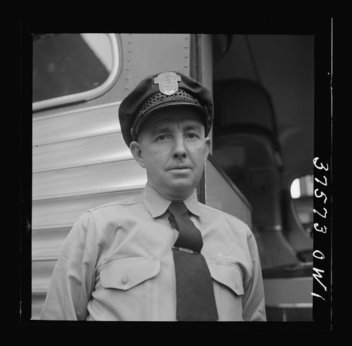 Untitled photo, possbly related to: Bernard Cochran, Greyhound bus driver. He has a perfect record of fourteen years, never having had an accident while driving a bus