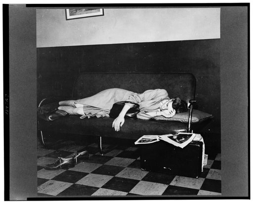 Chicago, Illinois. A girl who is waiting between buses in the ladies' lounge at four a.m. in the Greyhound bus terminal