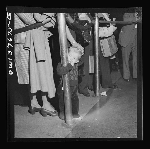 Chicago, Illinois. Passengers waiting to board a bus at the Greyhound bus terminal