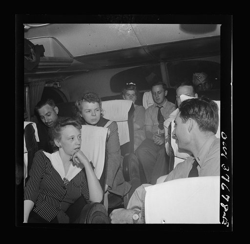 Passengers, who have struck up a friendship on a Greyhound bus enroute from Pittsburgh, Pennsylvania to Saint Louis, Missouri telling "moron" jokes