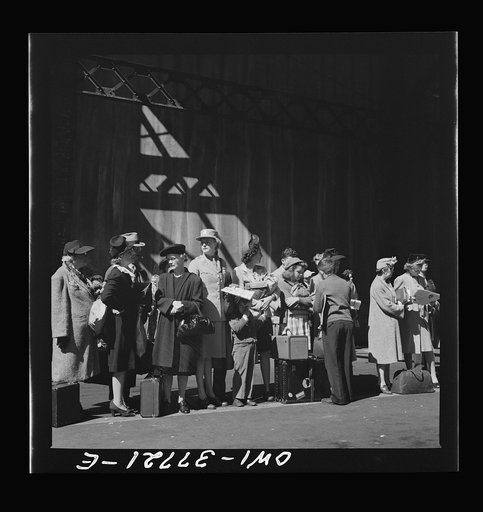 Untitled photo, possibly related to: Indianapolis, Indiana. Bus passengers in the Greyhound terminal