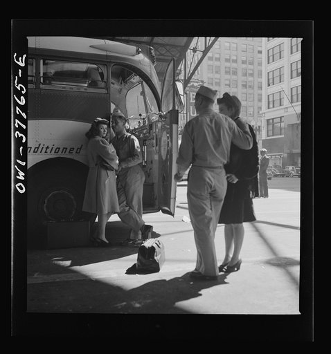 Untitled photo, possibly related to: Indianapolis, Indiana. A soldier and a girl saying goodbye at the Greyhound bus station