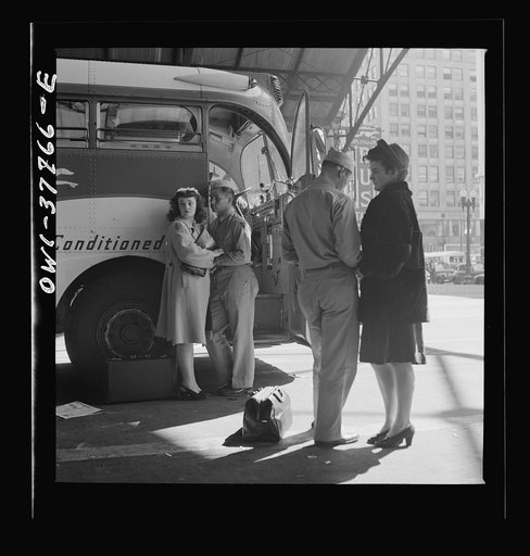 Indianapolis, Indiana. A soldier and a girl saying goodbye at the Greyhound bus station