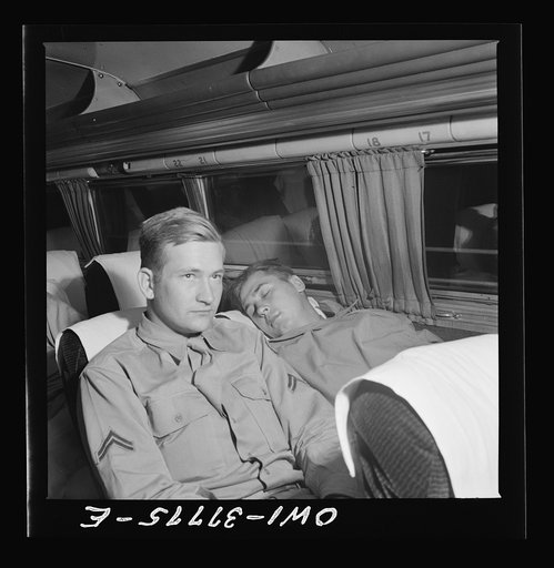 A soldier sleeping on the way from Cincinnati, Ohio to Louisville, Kentucky on a Greyhound bus