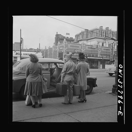 Chicago, Illinois. People waiting outside the Greyhound bus terminal