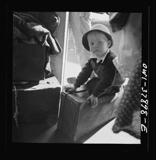 A Greyhound bus trip from Louisville, Kentucky, to Memphis, Tennessee, and the terminals. Small boy waiting for the bus at Chattanooga