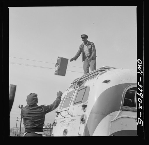 A Greyhound bus trip from Louisville, Kentucky, to Memphis, Tennessee, and the terminals. Loading a bus that carries baggage on the top. Chattanooga