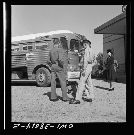 A Greyhound bus trip from Louisville, Kentucky, to Memphis, Tennessee, and the terminals. Bus passengers conversing at rest stop between Memphis and Chattanooga