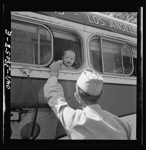 Bus trip from Knoxville, Tennessee to Washington, D.C. Soldier saying goodbye to his wife and child at small town in Tennessee