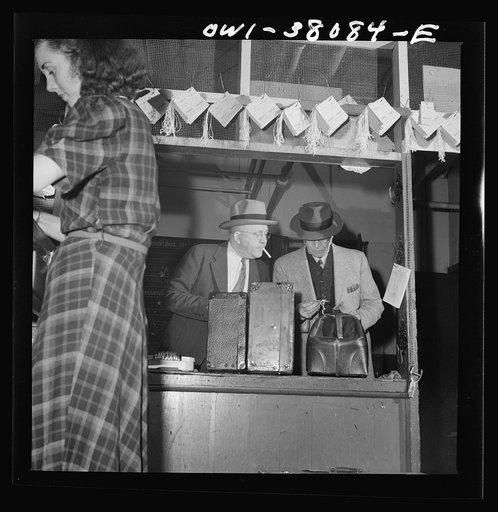 Bus trip from Knoxville, Tennessee, to Washington, D.C. Passenger checking baggage at Knoxville, Tennessee
