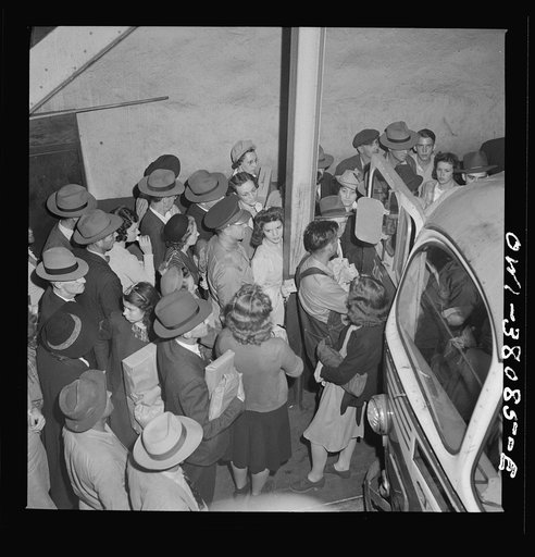 Bus trip from Knoxville, Tennessee, to Washington, D.C. Passengers boarding bus at Knoxville