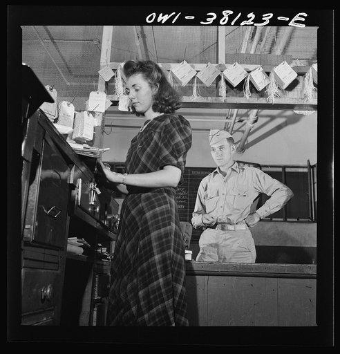 Bus trip from Knoxville, Tennessee, to Washington, D.C. Girl agent checking bag at Knoxville