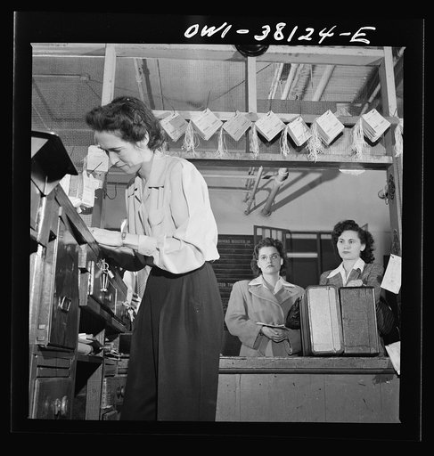 Bus trip from Knoxville, Tennessee, to Washington, D.C. Girl agent checking bag at Knoxville