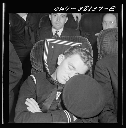 Bus trip from Knoxville, Tennessee, to Washington, D.C. Sailor on bus enroute to Washington from Roanoke
