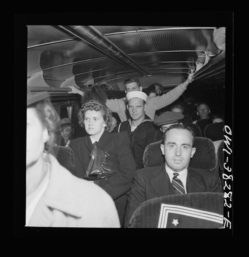 Passengers standing on a bus enroute from Roanoke, Virginia to Washington, D.C.
