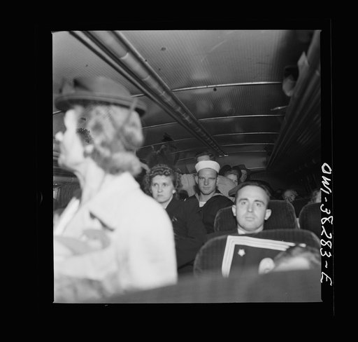 Untitled photo, possibly related to: Passengers standing on a bus enroute from Roanoke, Virginia to Washington, D.C.