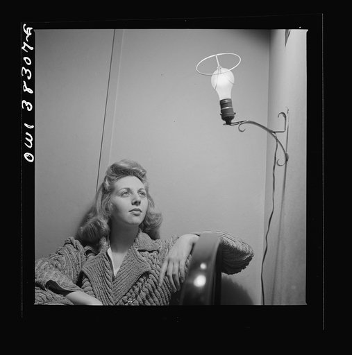 Washington, D.C. This U.S. Office of Price Administration clerk, speaking of her boardinghouse room says: "The light looks like an angel when I leave the shade off, so I do so"