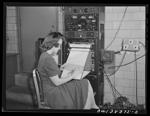 Washington, D.C. The U.S. Weather Bureau station at the National Airport. High frequency radio receiver recording signals from small radio transmitter attached to radios on a balloon aloft. The signals reveal temperature, humidity and pressure at various altitudes