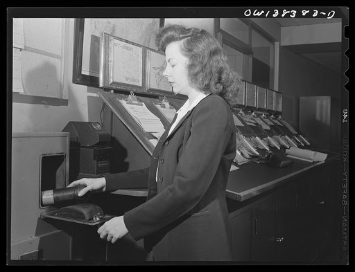 Washington, D.C. The U.S. Weather Bureau station at the National Airport. Receiving weather observations from all parts of the country by pnematic tube from the nearby communications station