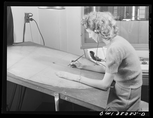 Washington, D.C. The U.S. Weather Bureau station at the National Airport. Plotting the course of a pilot balloon as it ascends into the atmosphere to determine the velocity and direction of winds above the surface