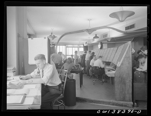 Washington, D.C. The U.S. Weather Bureau station at the National Airport. Flight advisory weather service. Here pilots in flight are warned of adverse weather conditions that might affect the safe operation of the aircraft